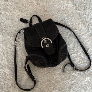 Black leather Coach backpack purse